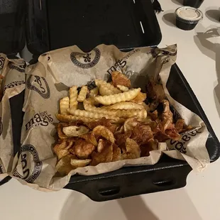 Grilled tenders (3 pcs) with chips and fries.