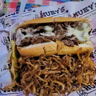 Philly cheese steak with side of onion straws