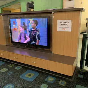 Tv and cellphone charging area