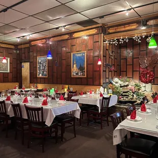 a restaurant with tables and chairs