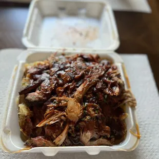 Sheri&apos;s fully loaded baked potato with spicy bbq sauce