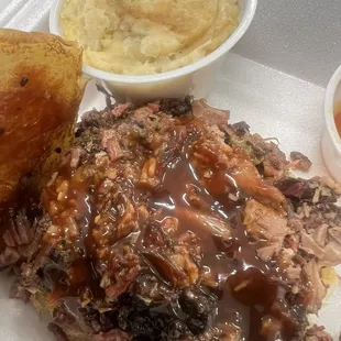 Pulled sandwich and loaded potatoes