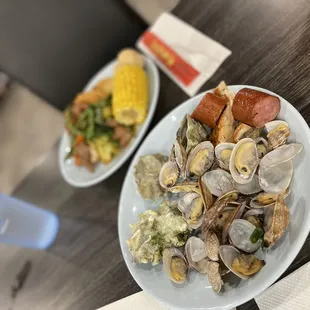 a plate of clams and corn