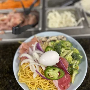 Mongolian Grill Station. Can make soup, udon, terriyaki, etc.
