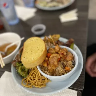 a bowl of noodles with meat and vegetables