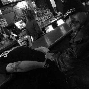 a man sitting at a bar