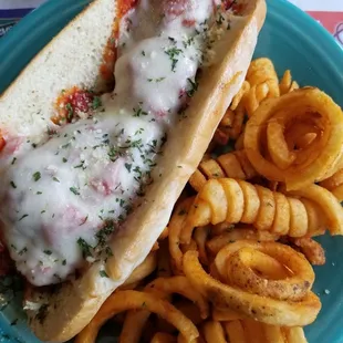 Meatball sub and curly fries