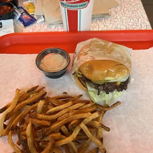 Hugh-Baby&apos;s double cheeseburger and fries.