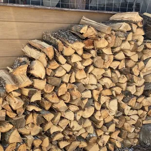 Wood for smoke flavor stacked in back