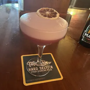 Currant passion . Egg white cocktail. Amazing. Highly recommend. Owen the creator of the cocktail made it for us. First class.