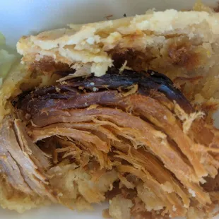 Tamale lacked red chilli sauce and the pork was very dry and over cooked.