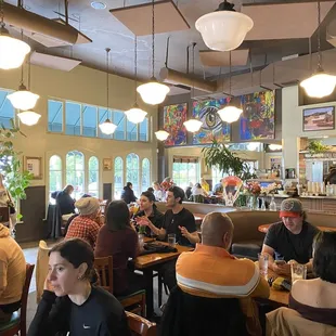 Bright and cheerful. An eclectic crowd.