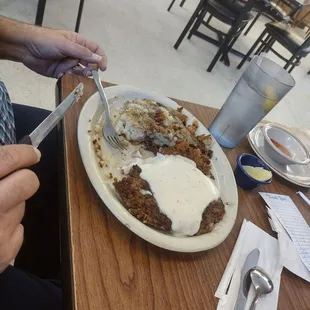 Chicken fried steak. Huge portions