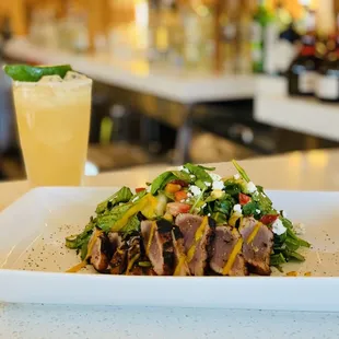 Ahi tuna salad and a top shelf margarita. Never disappointed when I come here.