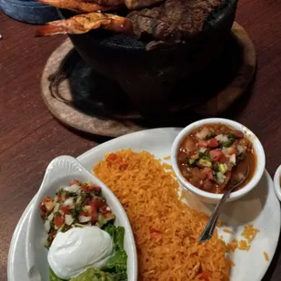 Pork, steak, chicken, sausage and grilled shrimp,  served with charro beans, grilled onions, guacamole, sour cream and tortillas. $25