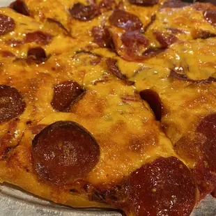 Pizza with cheddar cheese