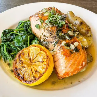 Pan Roasted Salmon with organic fingerling potatoes and organic garlic spinach.