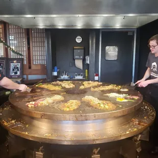 two men preparing food