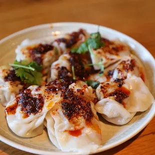 Instagram: @eat_saw_telle
 
 Spicy Pork Wonton
