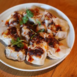 Instagram: @eat_saw_telle
 
 Spicy Pork Wonton
