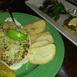 Spinach and artichoke dip and shrimp cakes.