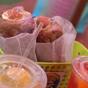 2 aloha dogs, pineapple lemonade and strawberry lemonade