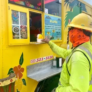 a man with a bandana on his face