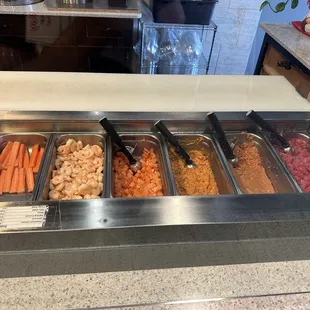 Protein selection L-R: eel, crab sticks, shrimp, salmon, spicy salmon, spicy tuna, tuna