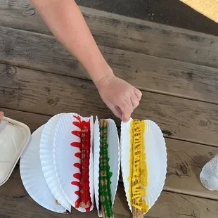 Churros with four different sauces (chocolate far left, strawberry, mango and pineapple)