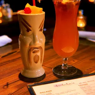 a hawaiian drink and a tiki