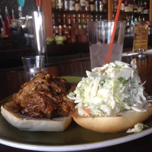 Pork sandwich ($9.00) that&apos;s not a side of slaw- comes std. Add sides $2