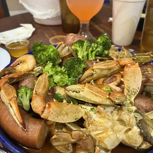 Our combination: 18 shrimp, crabs, 2 sausage, potatoes, broccoli and mushroom in spicy seasoning.