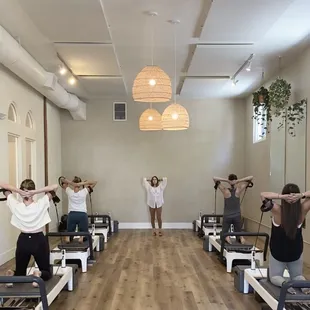 Group class in Reformer Studio