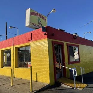 a yellow and red building