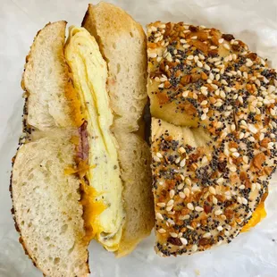 Everything bagel with egg, cheddar cheese, and turkey bacon