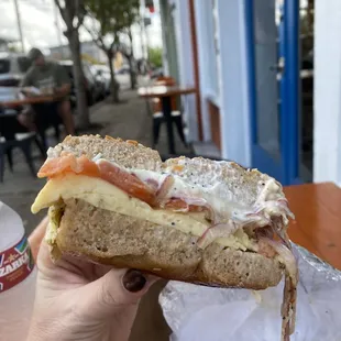Everything bagel with grilled tomatoes and cream cheese