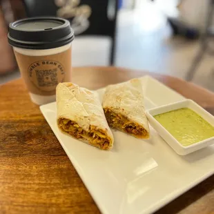 a burrito and a cup of coffee