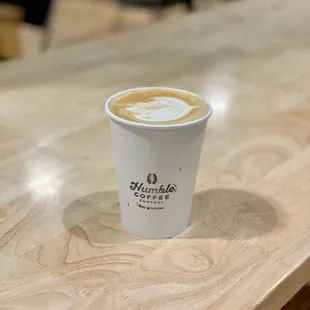 a cup of coffee on a table