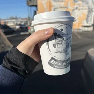 Dirty chai--cup stamped with an announcement of their annual holiday market!