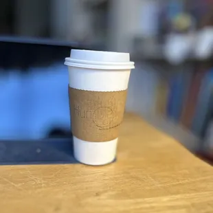 a coffee cup on a table