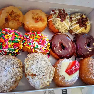 a variety of donuts in a box
