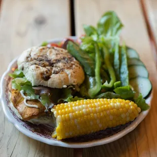 a plate of food on a wooden table