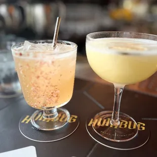 two cocktails on a table