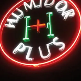 a neon sign in the dark