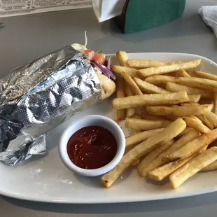 Beef and lamb gyro sandwich combo with drink and fries.