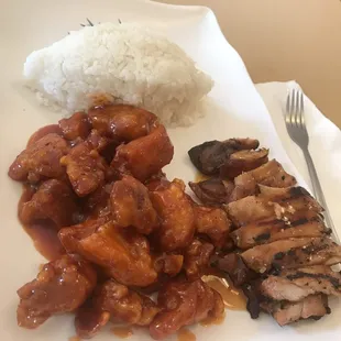 Lunch special of half chicken teriyaki and half sweet and sour chicken. Doesn&apos;t come with a side salad.