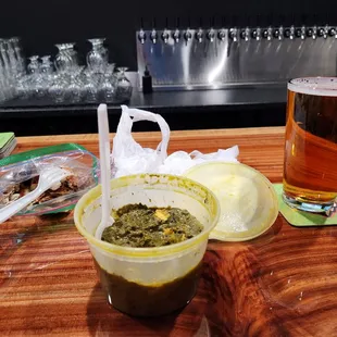 Lunch leftovers of palak paneer + naan with pint of Urban Roots lager ($7)