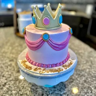 a cake with a crown on top