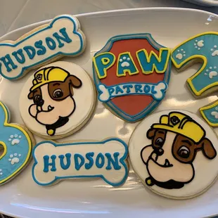 paw patrol cookies on a plate