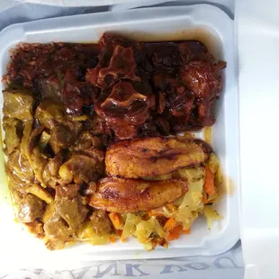 Curry goat and oxtail combo...delish..